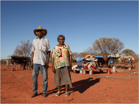 Banjo and a woman from the community at Honeymoon Bore