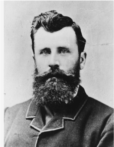 A black and white photo of Charles Winnecke